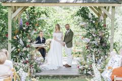 Wedding ceremony under the arbour