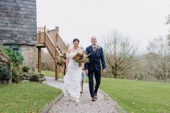 Being walked to the wedding barn