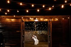 In the really rustic barn at night