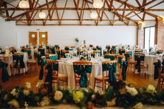 The red Brick barn set for the wedding breakfast