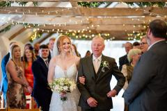 Dad walking bride down the aisle