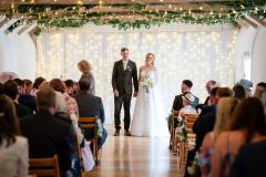 The couple in the wedding barn