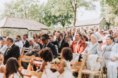 Guests at an outdoor ceremony