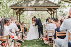 During the vows at an outdoor ceremony at the Lawn Arbour. We have 2 outdoor ceremony options