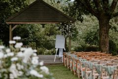 An outdoor wedding under the Oak Arbour