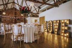 The red brick barn ready for the wedding meal