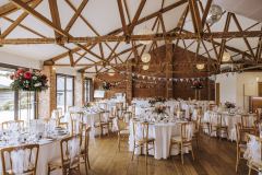 The red brick barn ready for the wedding meal