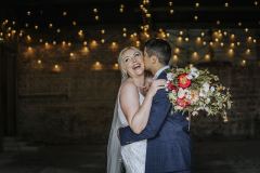 Just married photos in the really rustic barn