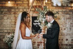 couple exchanging vows