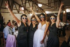 friends dancing in funny glasses