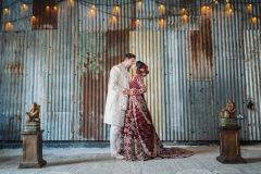 Bride & Groom in Really Rustic Barn