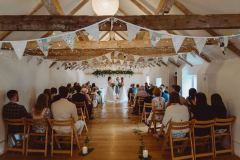 Teh ceremony in the Wedding Barn