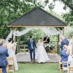 An outdoor ceremony at the lawn arbour