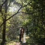 A couple walk in the woods